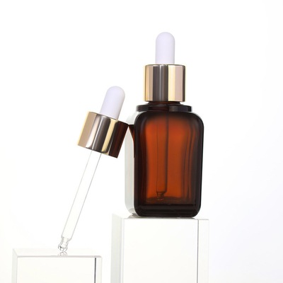 Compte-gouttes en verre cosmétique en aluminium 20mm pour l'huile essentielle de soins de la peau